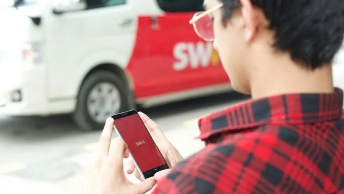 SWVL vehicle and riders